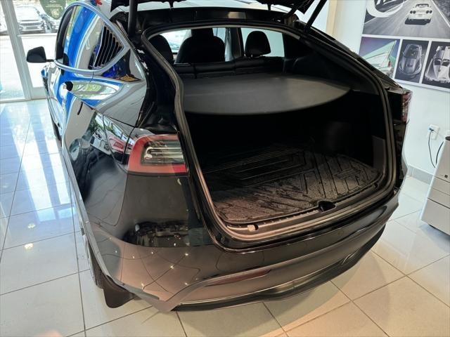 used 2023 Tesla Model Y car, priced at $32,995