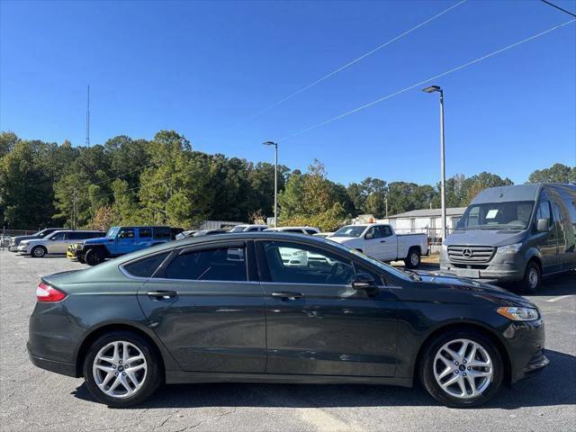 used 2015 Ford Fusion car, priced at $7,990