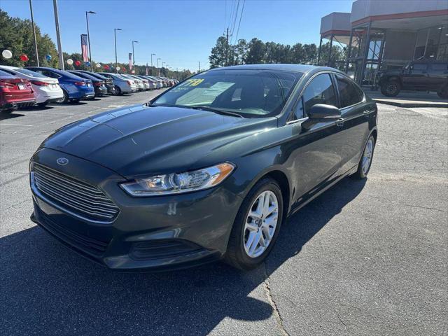 used 2015 Ford Fusion car, priced at $7,990