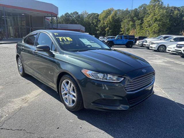 used 2015 Ford Fusion car, priced at $7,990