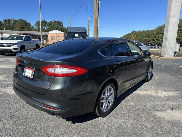 used 2015 Ford Fusion car, priced at $7,990