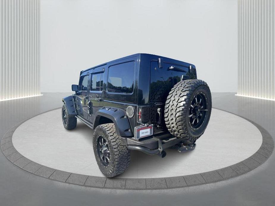 used 2013 Jeep Wrangler Unlimited car, priced at $19,900