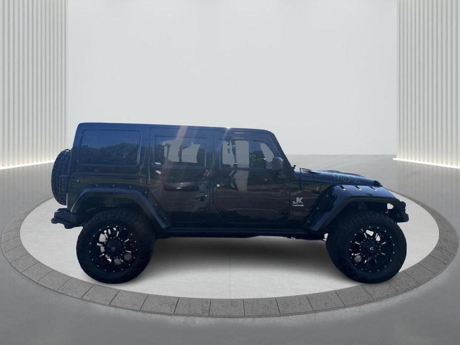 used 2013 Jeep Wrangler Unlimited car, priced at $19,900