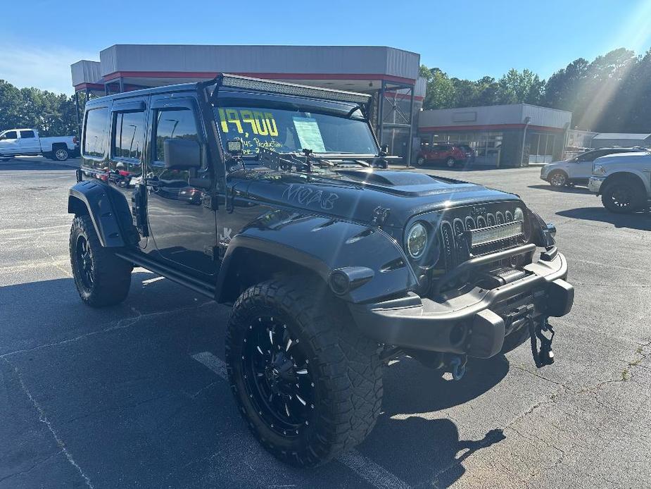 used 2013 Jeep Wrangler Unlimited car, priced at $19,900