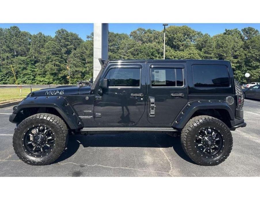 used 2013 Jeep Wrangler Unlimited car, priced at $19,900