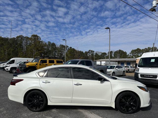 used 2018 Nissan Altima car, priced at $10,900