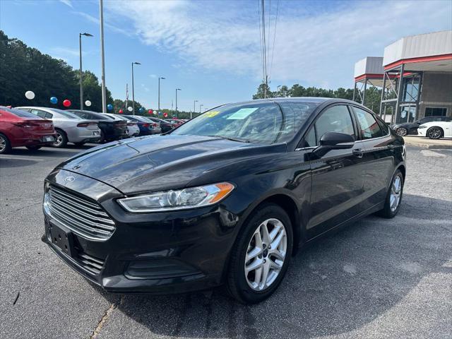 used 2015 Ford Fusion car, priced at $7,990