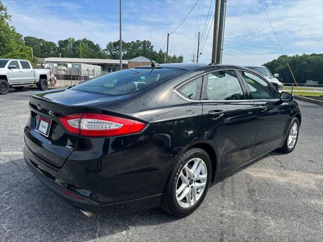 used 2015 Ford Fusion car, priced at $7,990