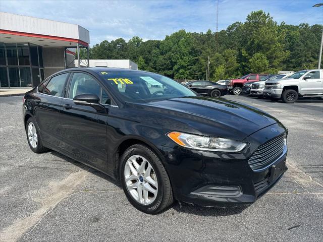 used 2015 Ford Fusion car, priced at $7,990