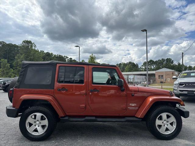 used 2009 Jeep Wrangler Unlimited car, priced at $10,900