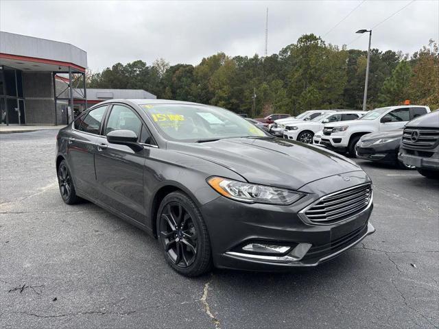 used 2018 Ford Fusion car, priced at $13,900