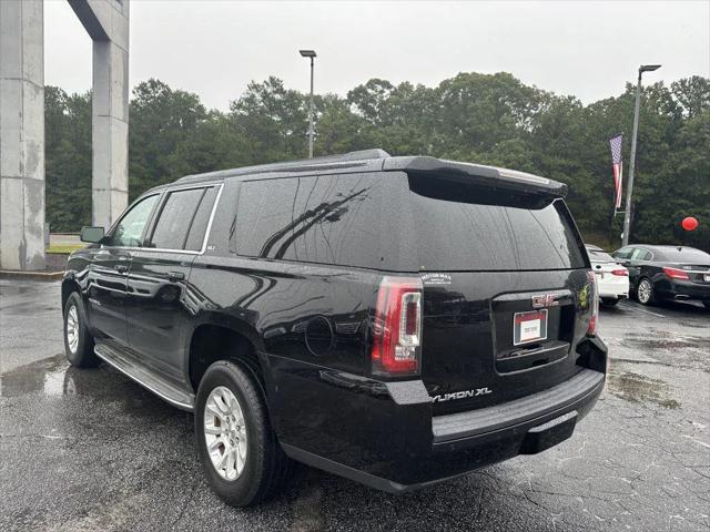 used 2015 GMC Yukon car, priced at $15,900