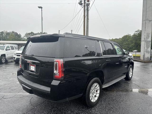 used 2015 GMC Yukon car, priced at $15,900