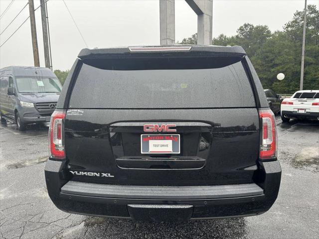 used 2015 GMC Yukon car, priced at $15,900