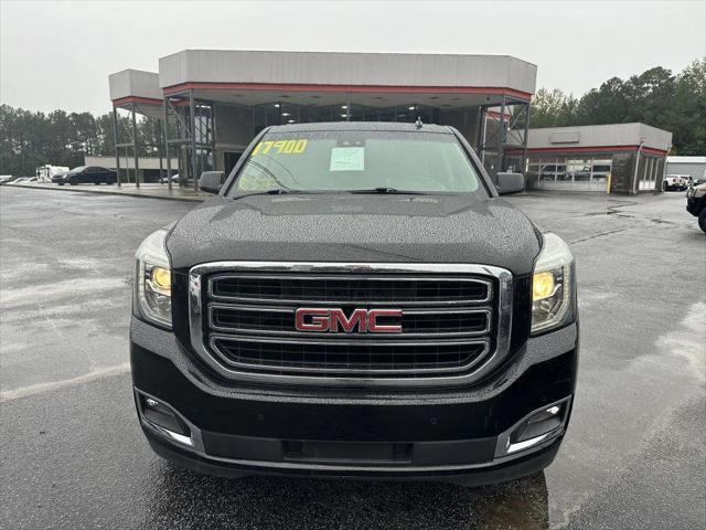 used 2015 GMC Yukon car, priced at $15,900