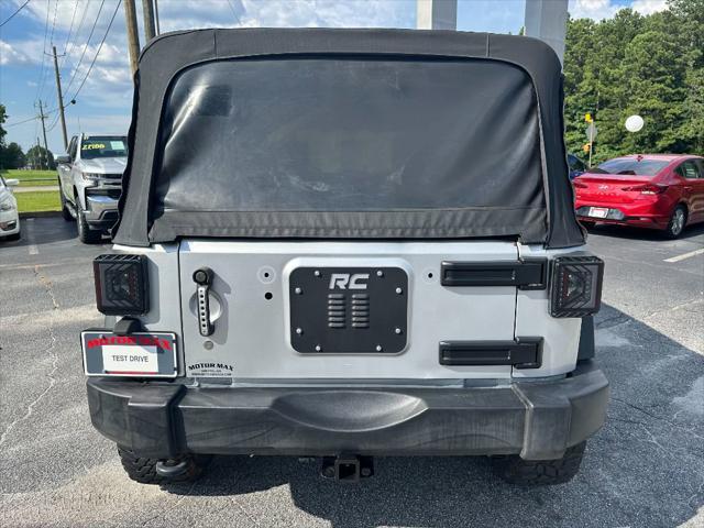 used 2012 Jeep Wrangler Unlimited car, priced at $9,990