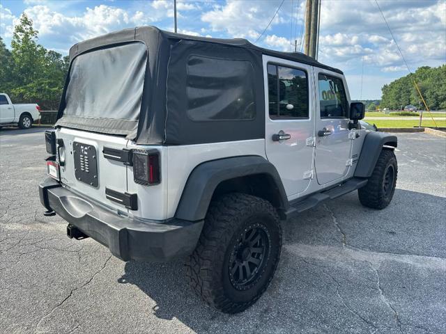 used 2012 Jeep Wrangler Unlimited car, priced at $9,990
