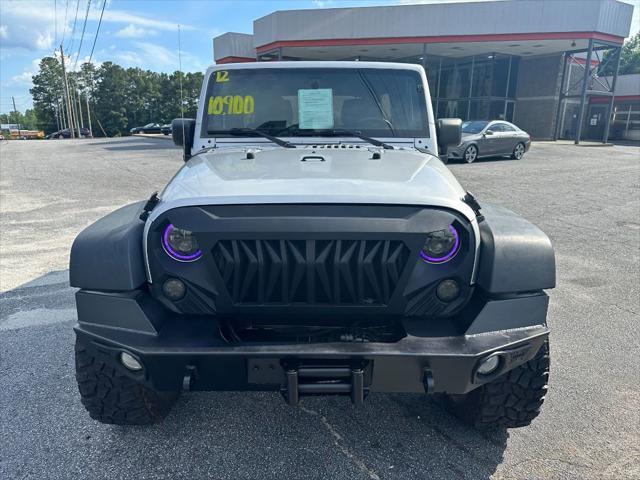 used 2012 Jeep Wrangler Unlimited car, priced at $9,990