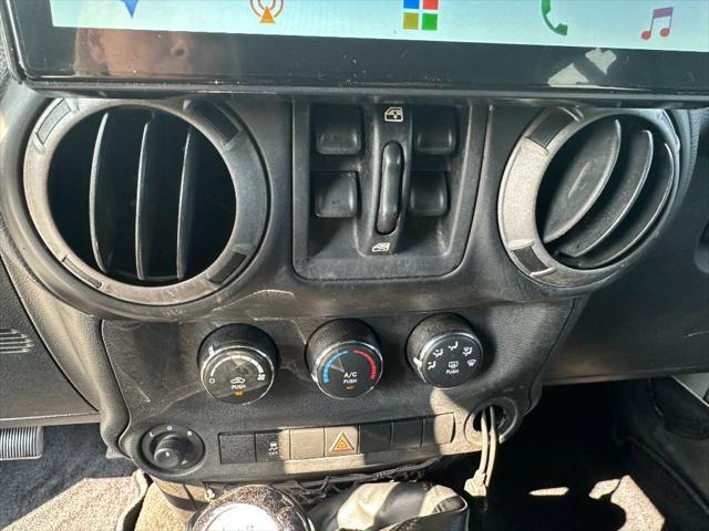 used 2012 Jeep Wrangler Unlimited car, priced at $9,990