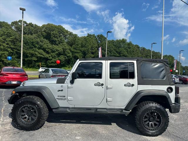 used 2012 Jeep Wrangler Unlimited car, priced at $9,990