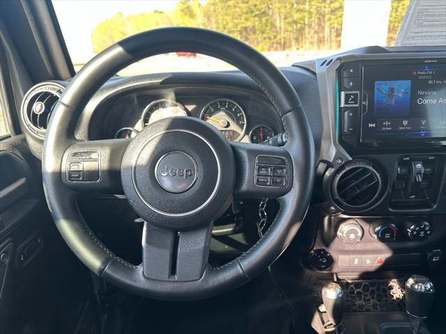 used 2015 Jeep Wrangler Unlimited car, priced at $13,900