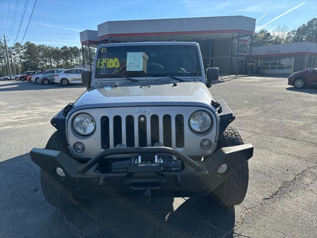 used 2015 Jeep Wrangler Unlimited car, priced at $13,900