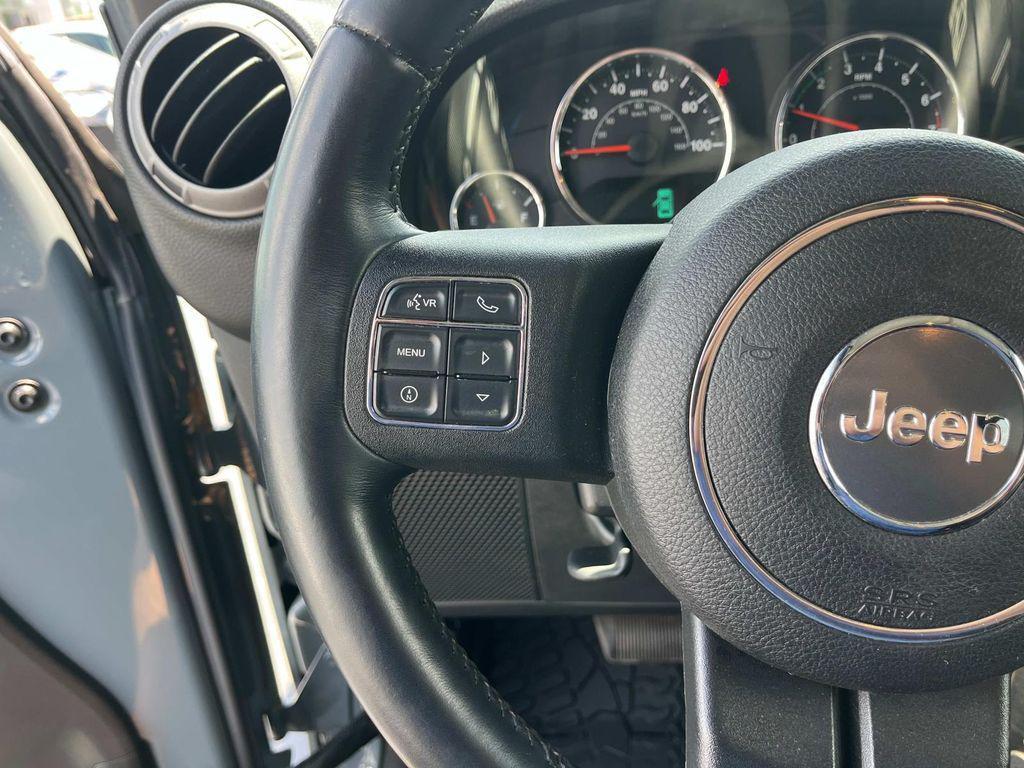 used 2015 Jeep Wrangler Unlimited car, priced at $23,990