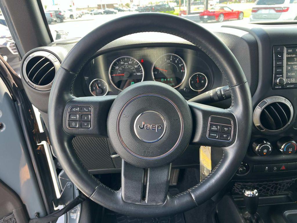 used 2015 Jeep Wrangler Unlimited car, priced at $23,990