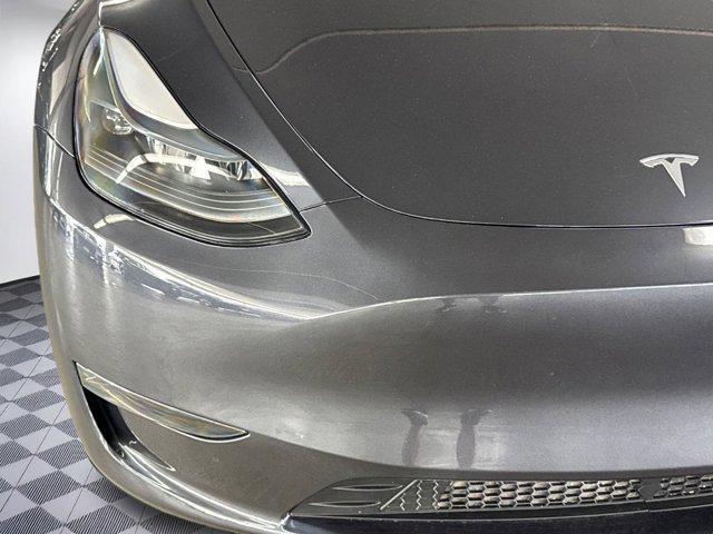 used 2024 Tesla Model Y car, priced at $37,999