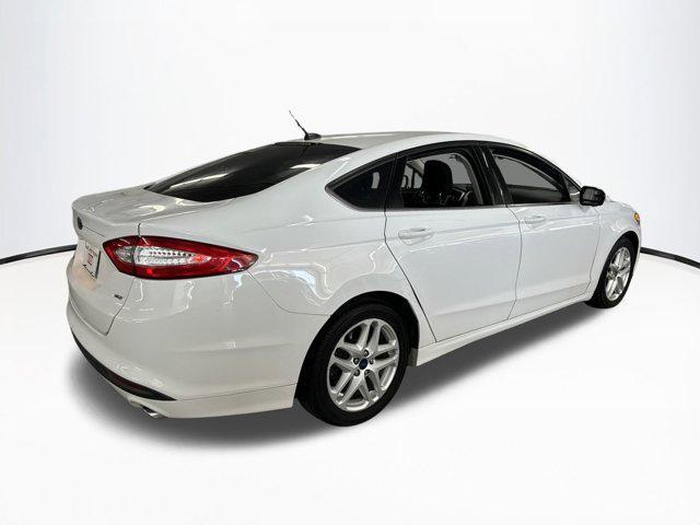 used 2015 Ford Fusion car, priced at $7,999