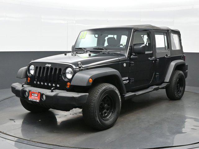 used 2013 Jeep Wrangler Unlimited car, priced at $16,749