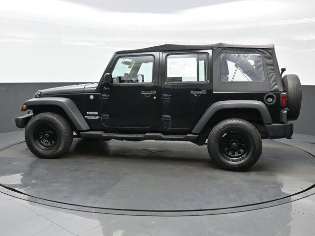 used 2013 Jeep Wrangler Unlimited car, priced at $16,749
