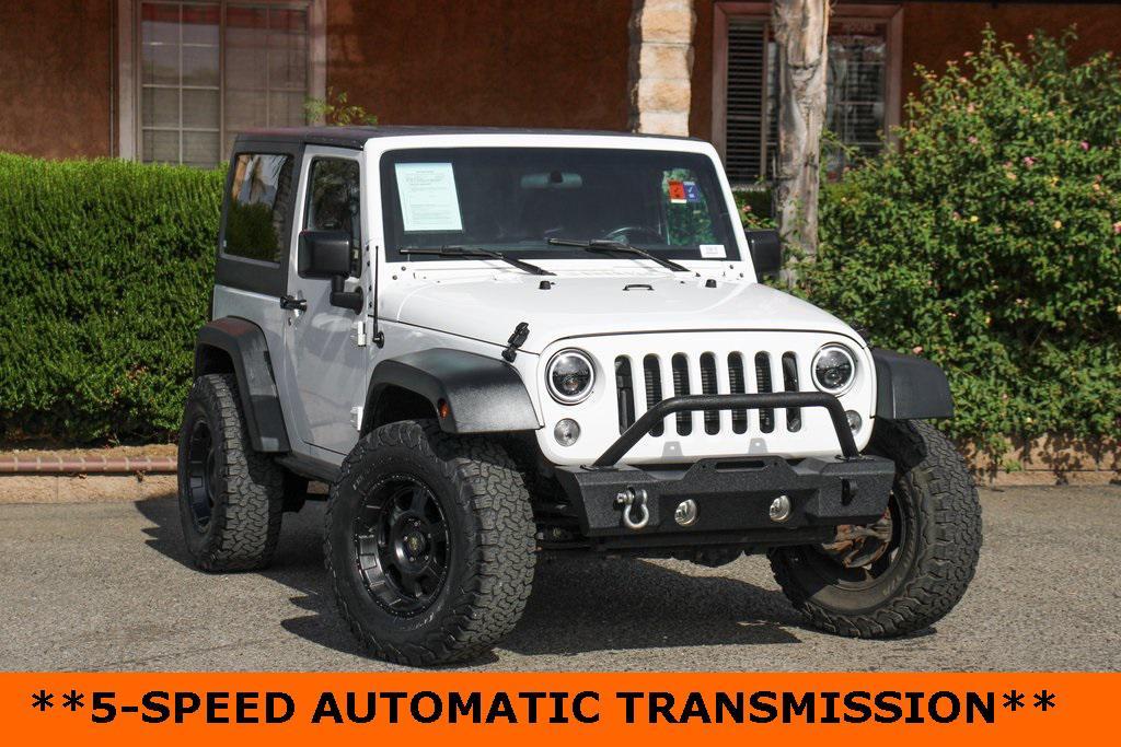 used 2015 Jeep Wrangler car, priced at $15,995