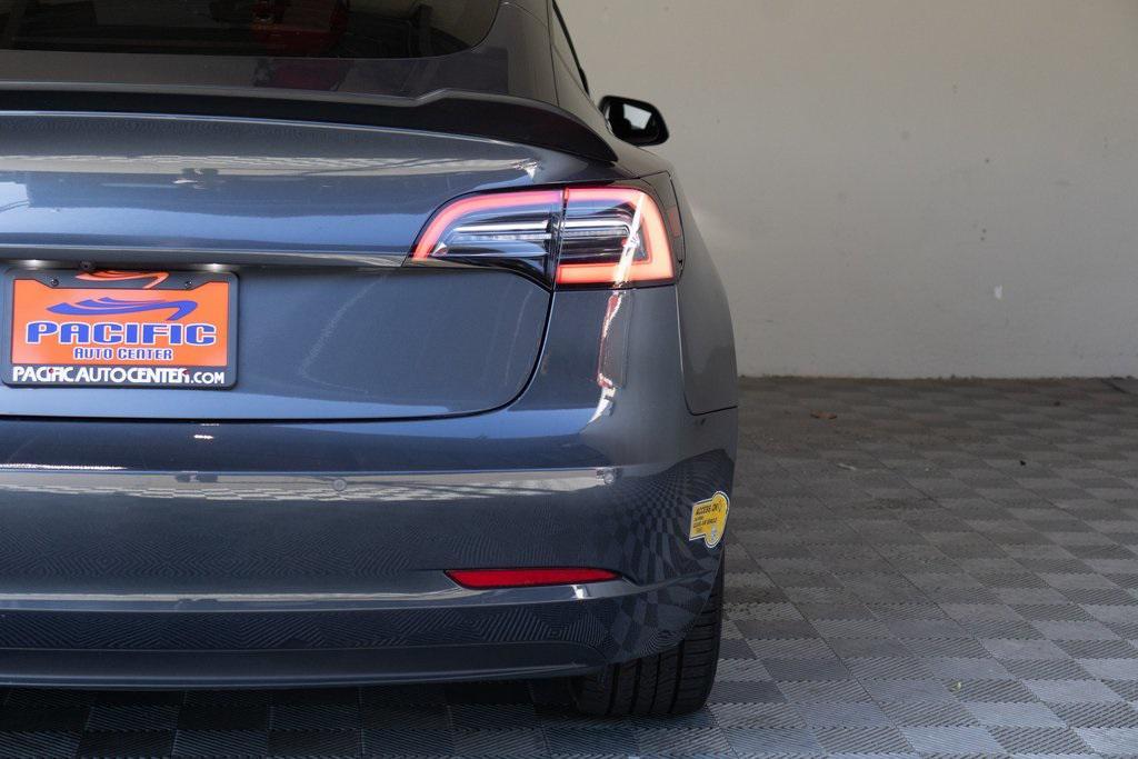 used 2022 Tesla Model 3 car, priced at $19,995