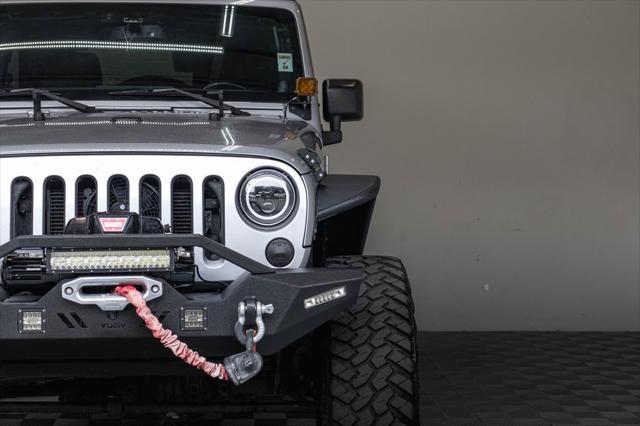 used 2014 Jeep Wrangler Unlimited car, priced at $17,995