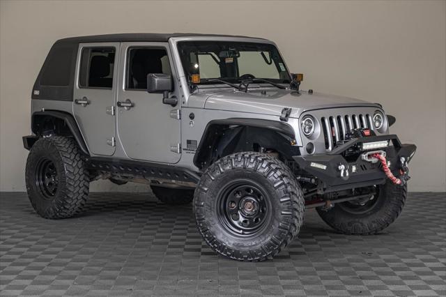 used 2014 Jeep Wrangler Unlimited car, priced at $17,995