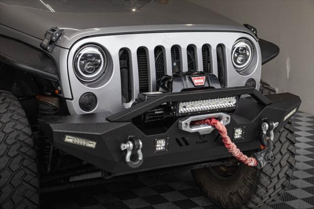 used 2014 Jeep Wrangler Unlimited car, priced at $17,995