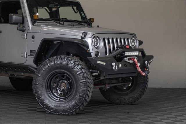 used 2014 Jeep Wrangler Unlimited car, priced at $17,995