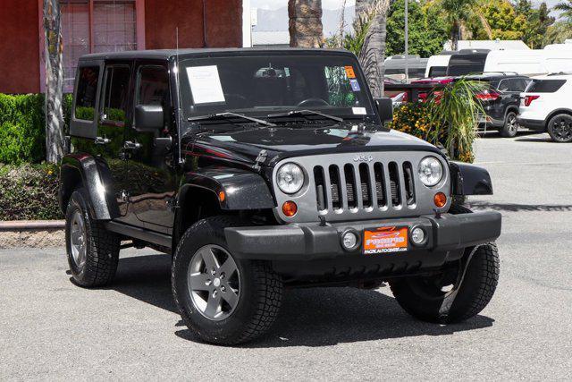 used 2013 Jeep Wrangler Unlimited car, priced at $15,995