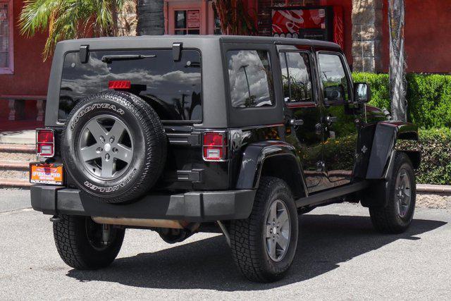 used 2013 Jeep Wrangler Unlimited car, priced at $15,995