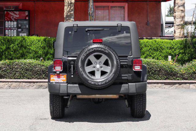 used 2013 Jeep Wrangler Unlimited car, priced at $15,995