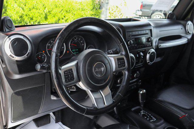 used 2013 Jeep Wrangler Unlimited car, priced at $15,995