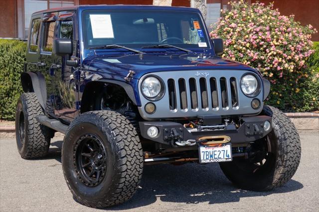 used 2012 Jeep Wrangler Unlimited car, priced at $16,995