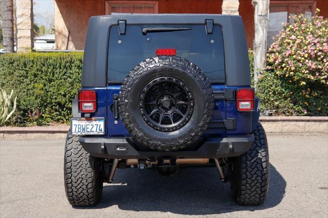 used 2012 Jeep Wrangler Unlimited car, priced at $16,995