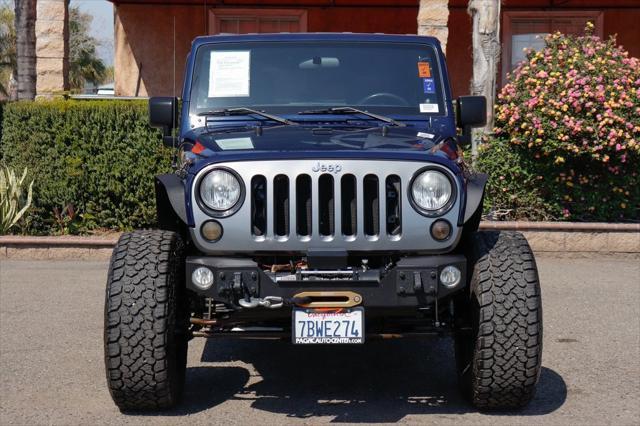 used 2012 Jeep Wrangler Unlimited car, priced at $16,995