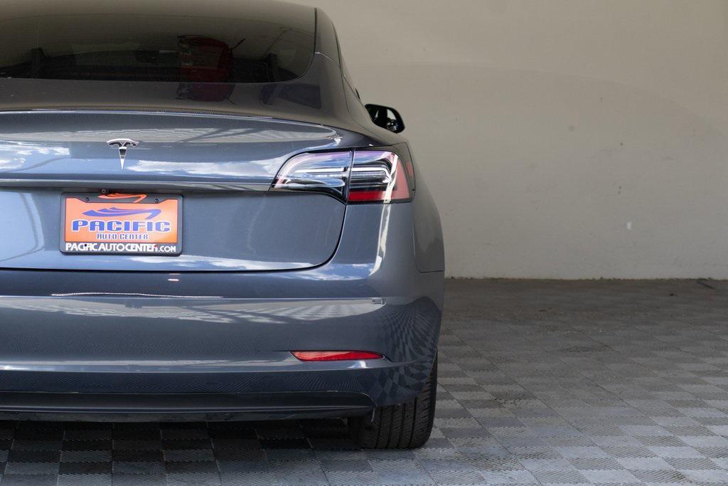 used 2023 Tesla Model 3 car, priced at $20,895