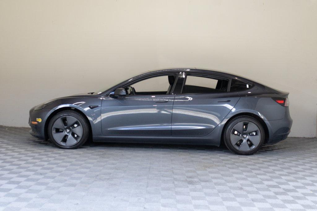 used 2023 Tesla Model 3 car, priced at $20,895