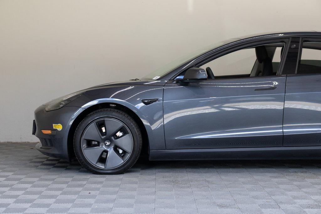 used 2023 Tesla Model 3 car, priced at $20,895