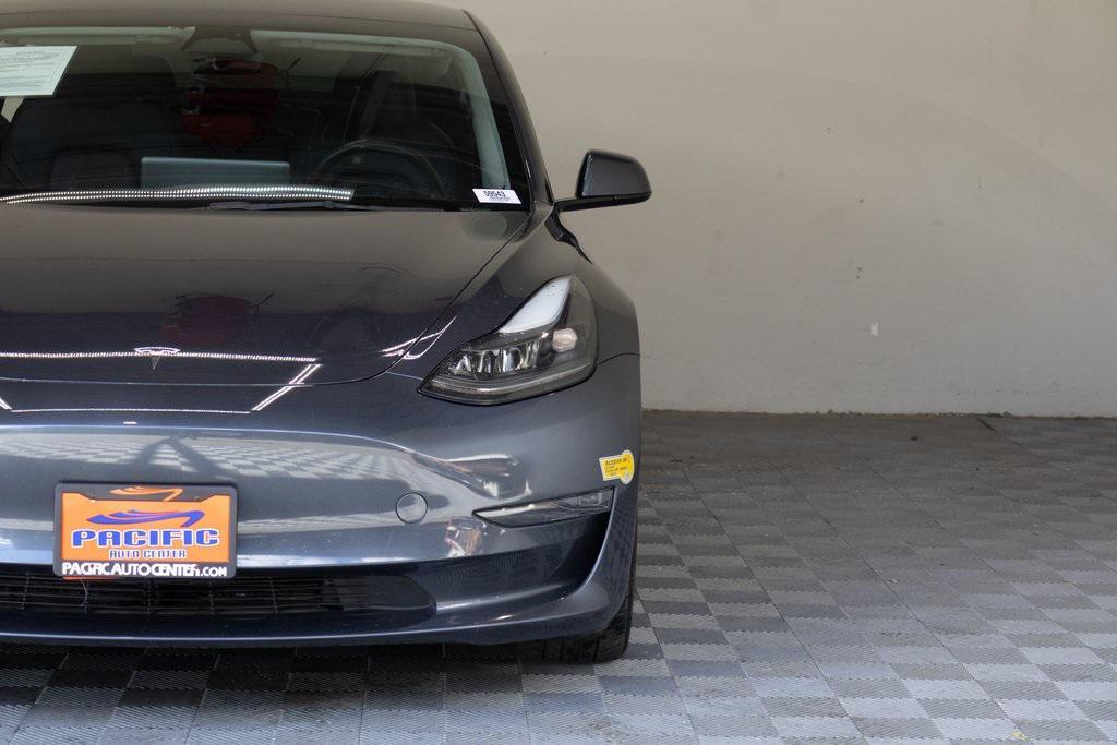 used 2023 Tesla Model 3 car, priced at $20,895