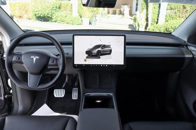 used 2023 Tesla Model Y car, priced at $36,995